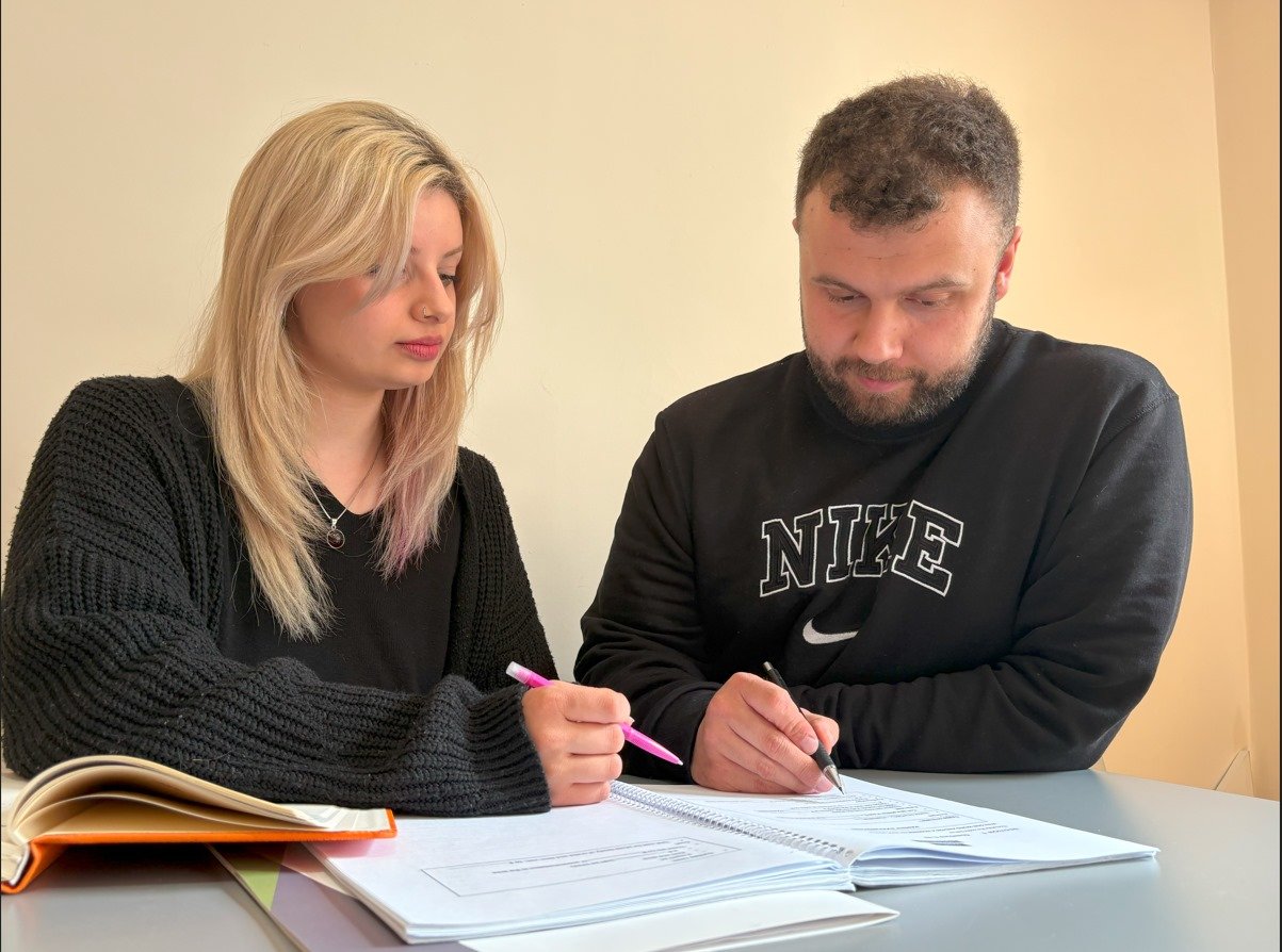IELTS teacher and student studying together